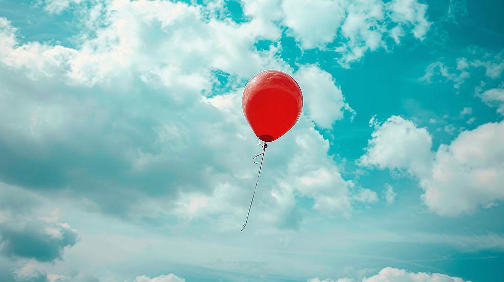Image of a cat walking away and a hand reaching out to grab the cat by the tail.