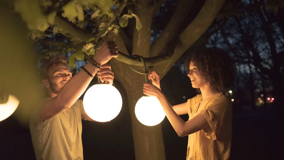 Bolleke portable light designed by Nathalie Schellekens from studio ONS for Fatboy teh original. A playful and functional light to hang in the parasol or a tree.