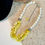 Thumbnail: Yellow and Pearl Necklace