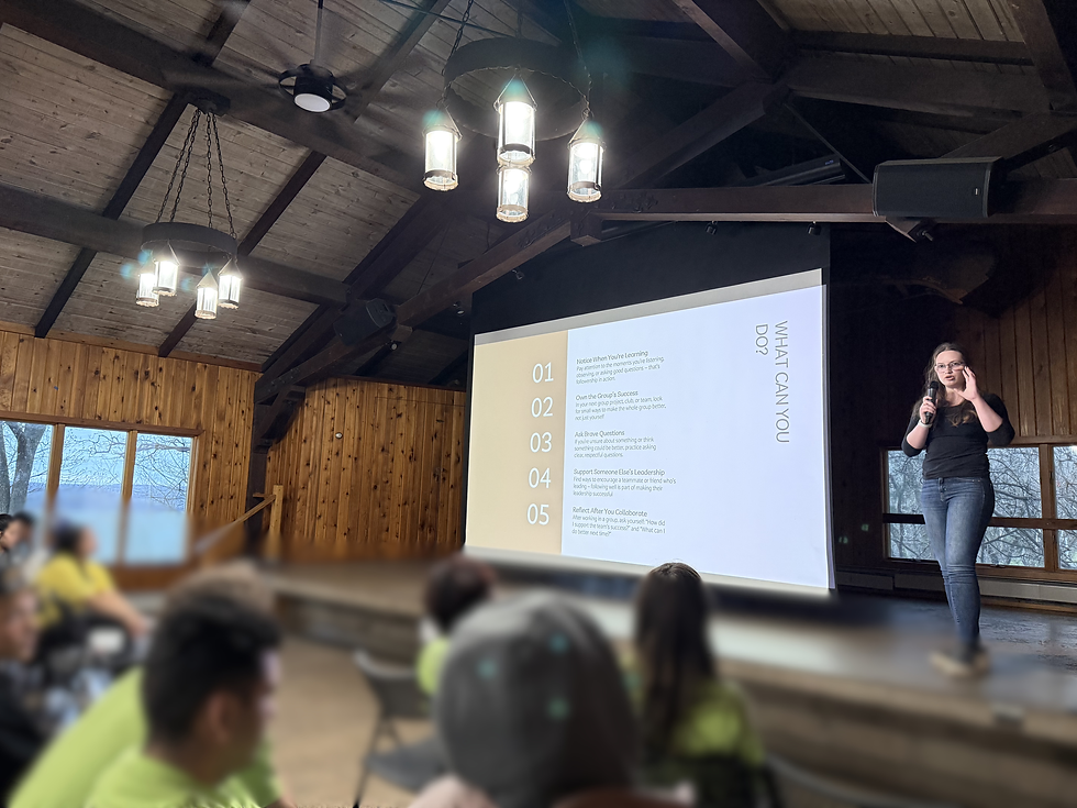 Ezri presenting to a crowd.