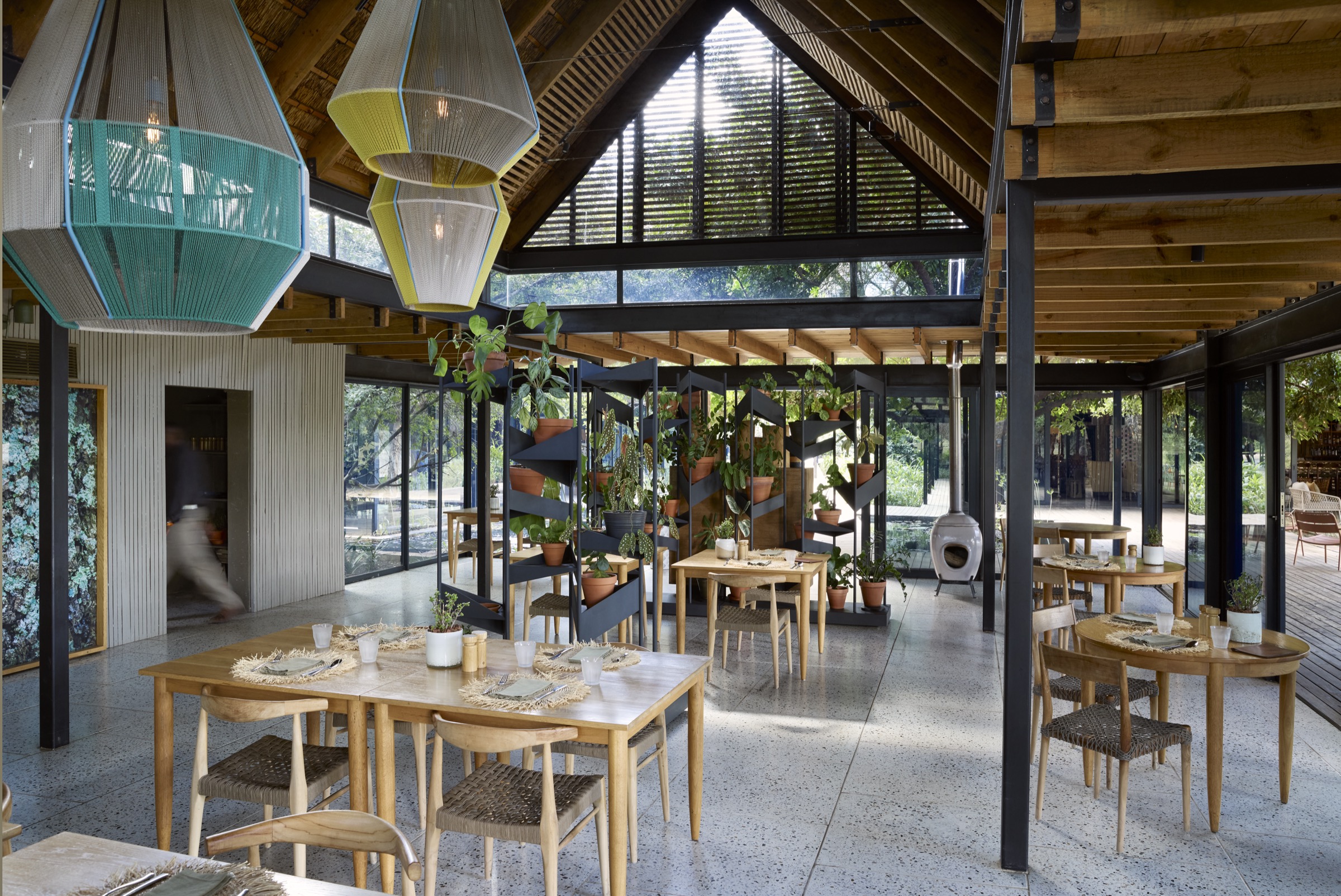 Light-filled dining room at Lion Sands River Lodge