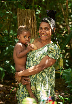 Mother breast feeding, Chimbu