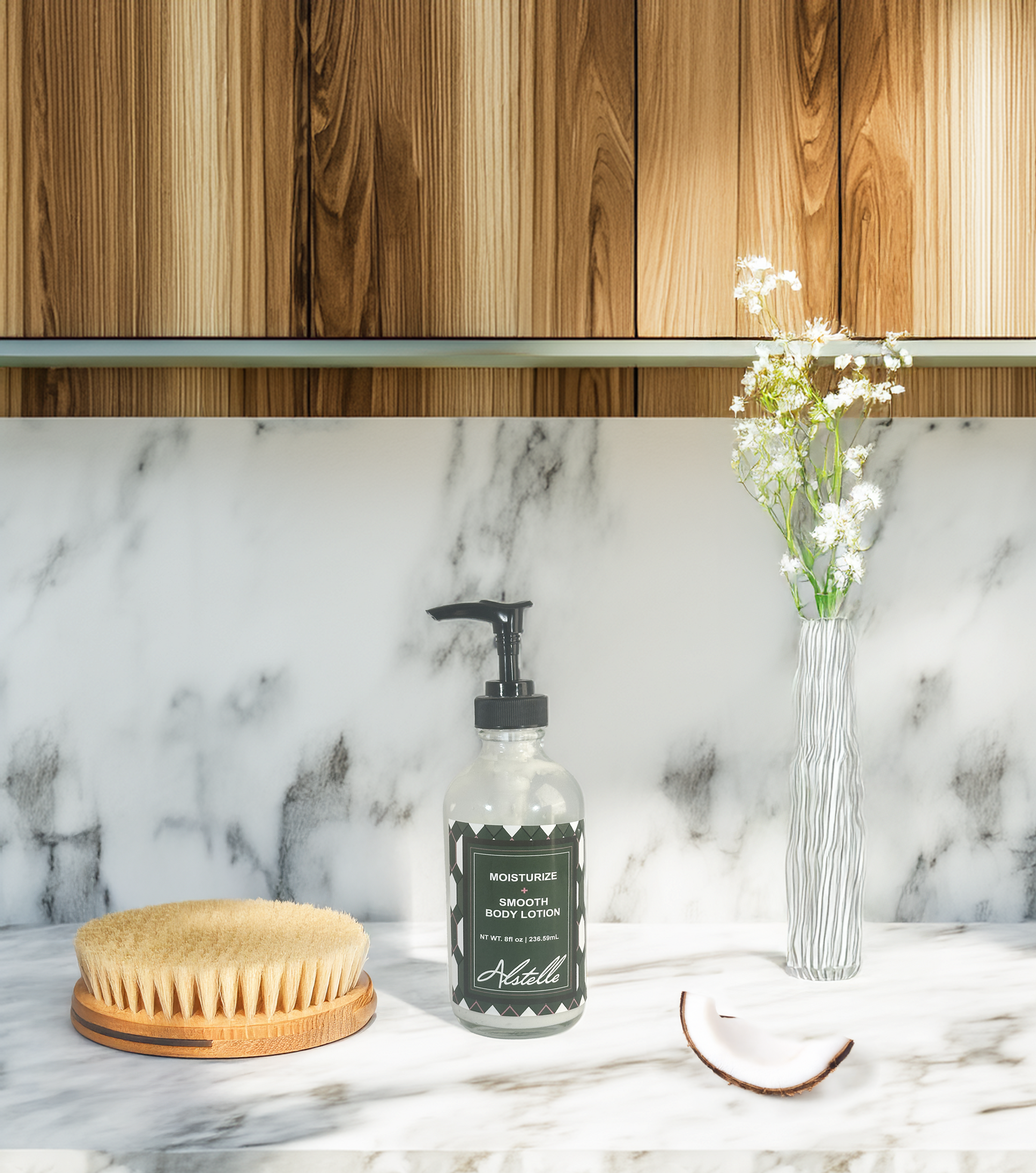 Alstelle moisturizing lotion, brush, flowers, and a coconut on marble background.