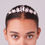 Thumbnail: Young woman models a gorgeous crystal tiara with sparkling clear stones.