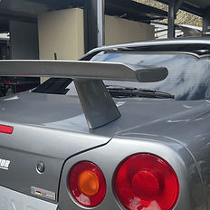 Rear view of Nissan Skyline R34 with polished tail lights and deep gloss finish after exterior detail | Cairns City & CBD, Trinity Beach, Clifton Beach & Palm Cove, Edmonton & Gordonvale, Redlynch & Brinsmead, Mount Sheridan & Bentley Park, All Northern Beaches suburbs