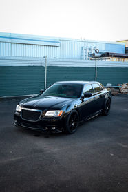 Front view of Chrysler showing passenger side and bonnet after exterior wash, decontamination, and paint correction by Samurai Auto Detailing in Cairns.