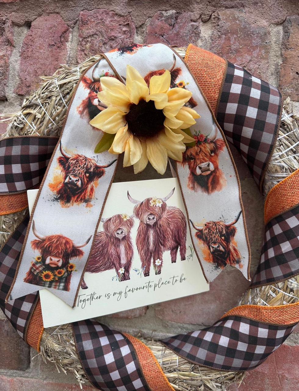 Thumbnail: Highland cow straw bale