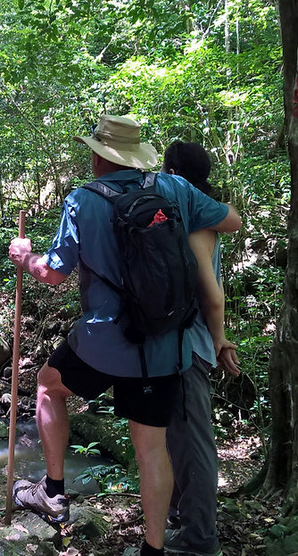 A couple hiking in the woods