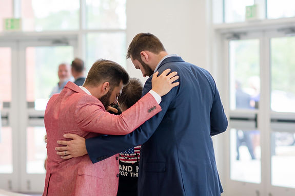 Praying In Lobby.jpeg
