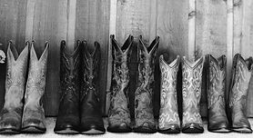 Brown cowboy boots bridesmaids with bouquet_edited_edited.jpg