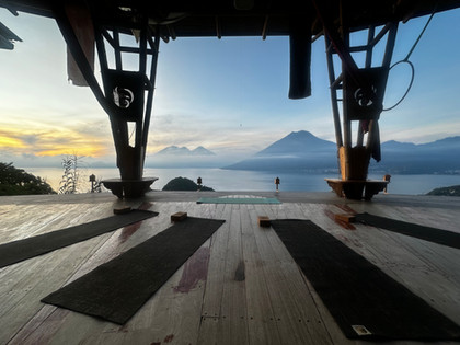 Participant jumping into Lake Atitlán from a dock.