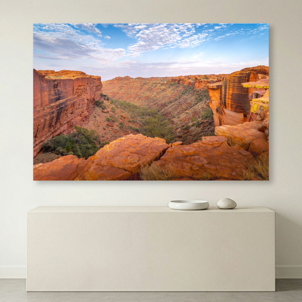 Metallic glass print hanging on wall showing Kings Canyon cliffs and expansive valley panorama