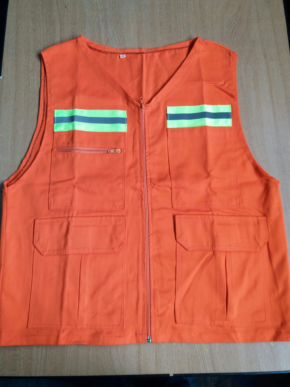 Miniatura: Chaleco de tela naranja con reflectivo