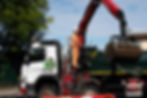 Photo of Martin, the director of M J Civils, working on a commercial project using their branded grab wagon