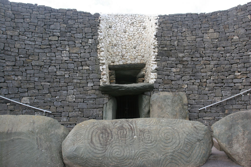The entrance to Newgrange burial mound, showing the highly decorated entrance stone.