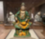 A Chinese ceramic figure of a seated Guanyin from the Ming Dynasty (1368-1644), inscribed by the maker, Qiao Bin 橋彬 (the Younger) and dated to 1500, at the Princeton University Art Museum