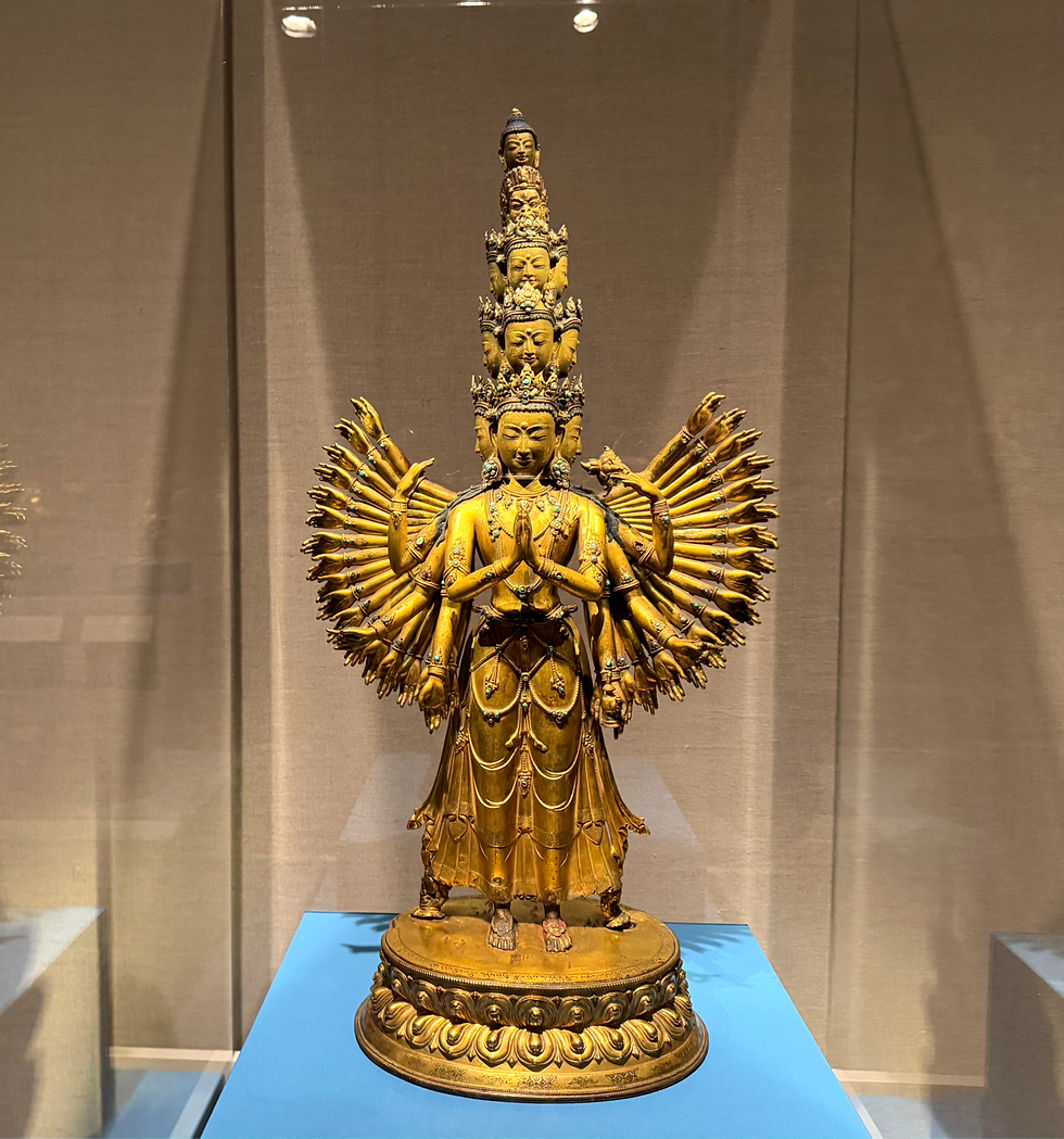 Large 15th Century Tibetan standing figure of thousand-armed Avalokiteshvara at the exhibition Mandalas: Mapping the Buddhist Art of Tibet at the Metropolitan Museum of Art in New York