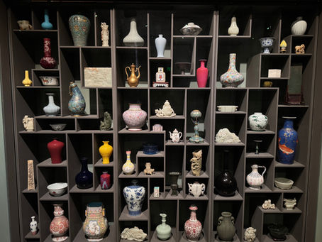 Cabinet of Chinese Imperial porcelain, jade, cloisonné enamel, and other decorative pieces at the Asian Art Museum in San Francisco