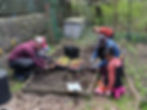 Gardeners start early spring lettuce planting. L to R: Mike Danchisko with his son Miles, Zoe Hanson and Danielle Herring Dazulma with daughter Camille.