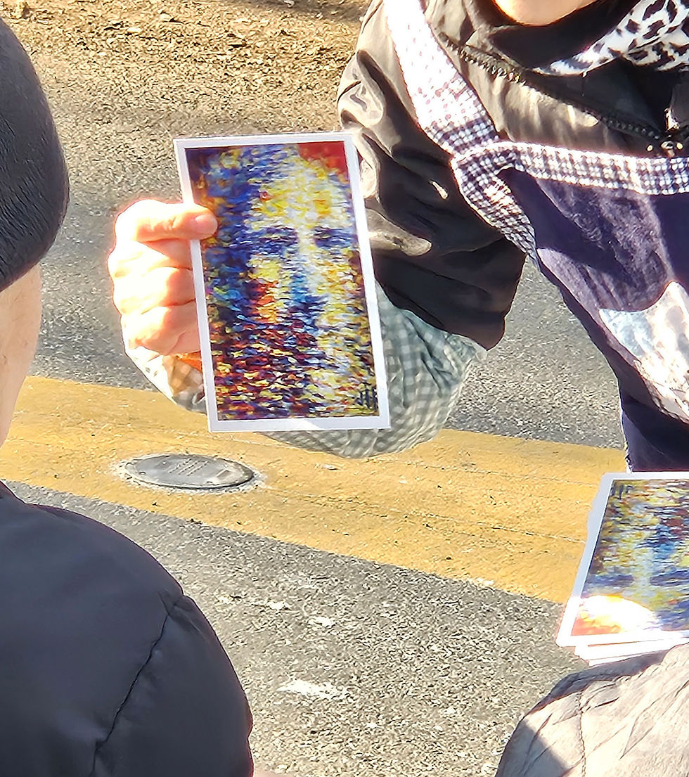 A person offers a vibrant, abstract postcard depicting Jesus to passersby as part of an evangelism effort.