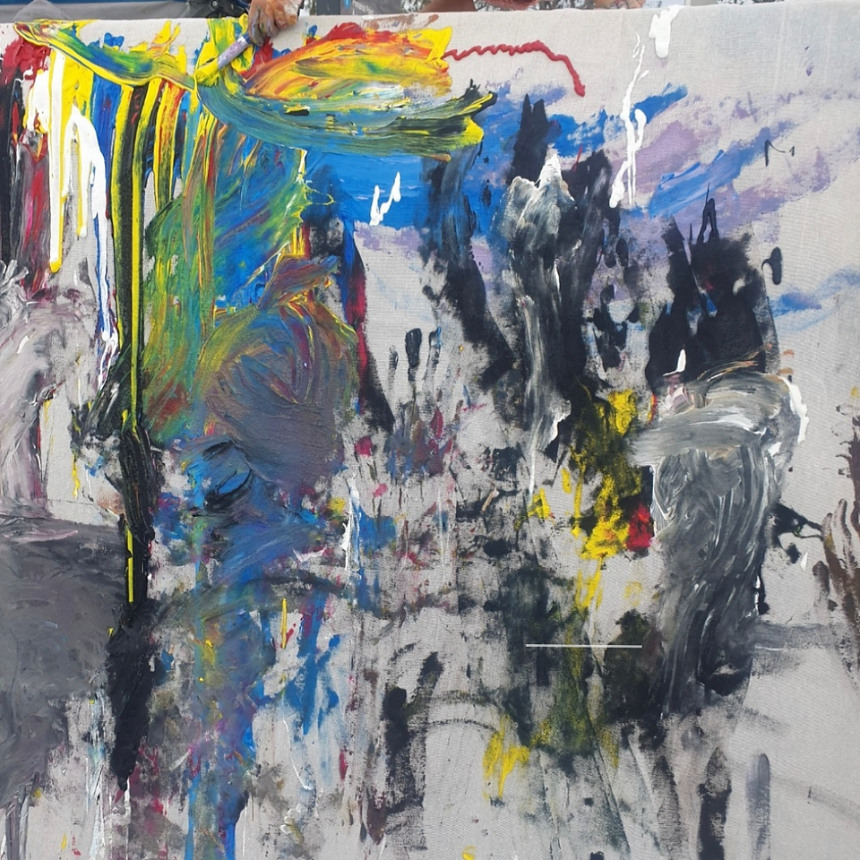 Abstract painting created at art play using lots of different colours.