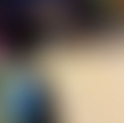 person putting stickers on paper