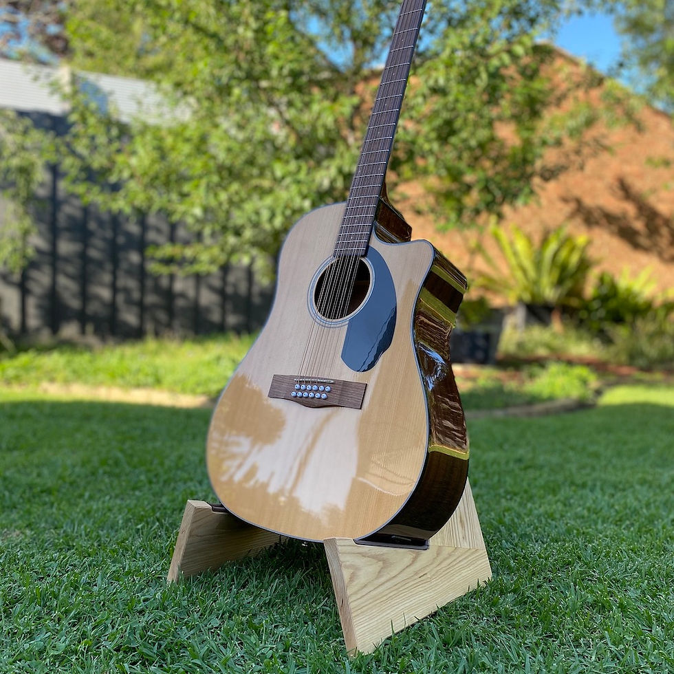 Thumbnail: Timber guitar stand with acoustic guitar angled view