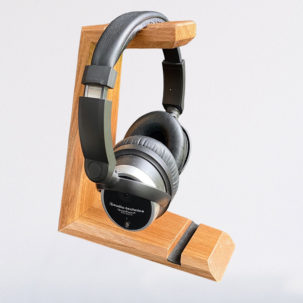 Thumbnail: Headphone stand with headphones hanging on rest