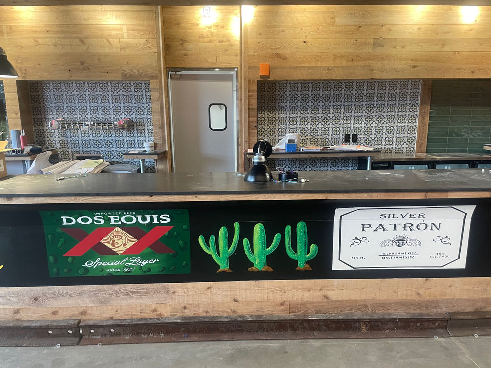 Painted Beer logo mural At phil Sandovals in Birmingham Alabama