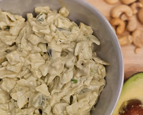 Creamy dairy-free crunchy goddess salad with avocado, lemon, and cashews