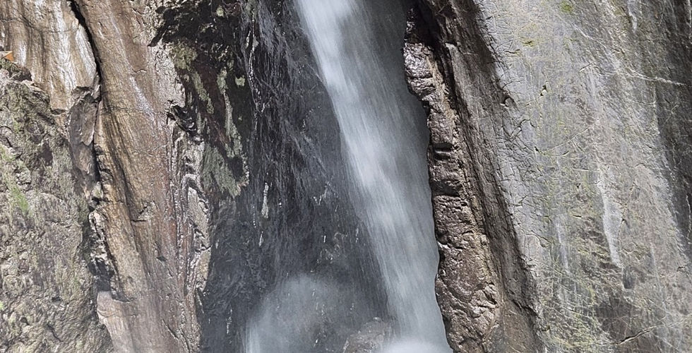 gushing waters surrounded by rocky walls