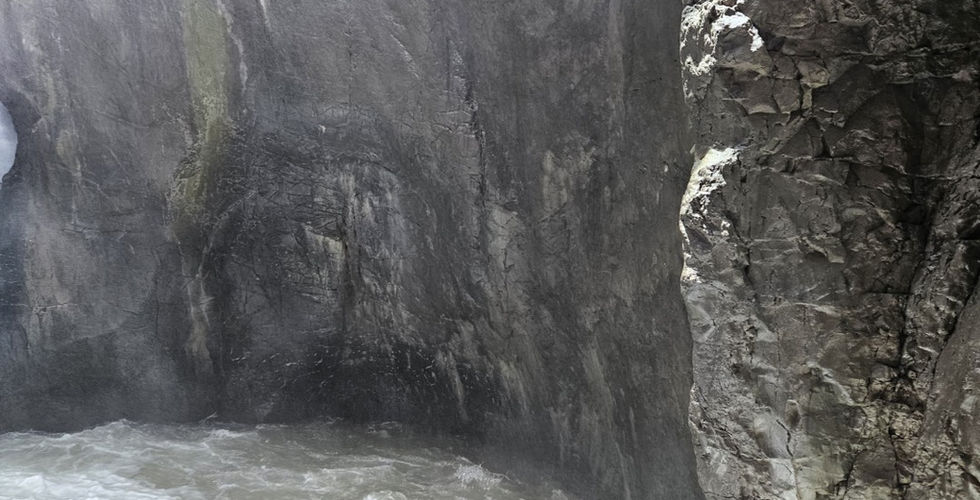 rushing waters surrounded by rocky walls