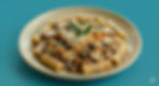 Tortiglioni trufados con champiñones