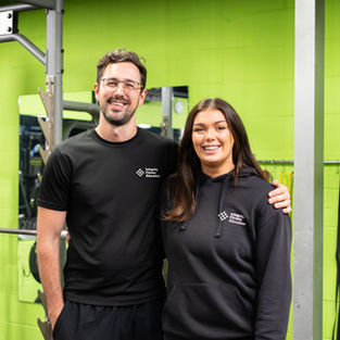 Harry and Paris Matthew's, the leaders of Integrity Fitness posed next to one another