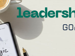 Leader reading a microlearning workbook with coffee and notebook — representing practical leadership growth and reflection.