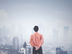 Leadership in 2025 concept — silhouettes of leaders standing against a modern city skyline, symbolizing change, reflection, and direction for the year ahead.