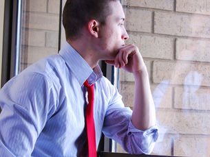 Leader reflecting to develop self-awareness.
