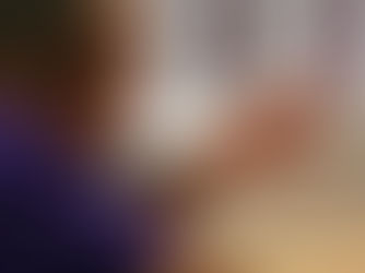 Professional speaker wearing a headset, communicating with confidence during a presentation.