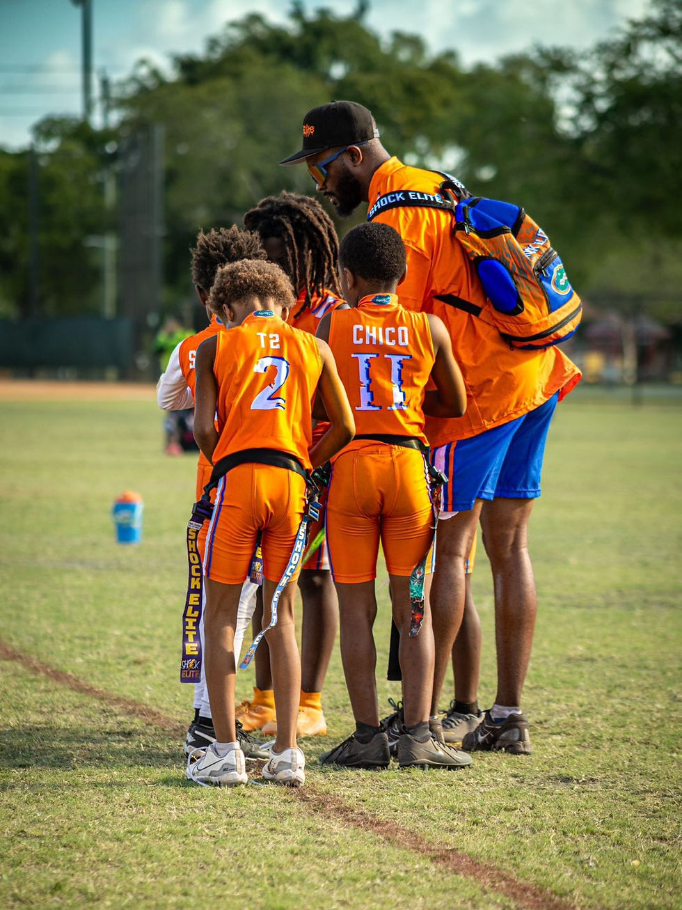 Shock Elite Flag Football Team Huddle