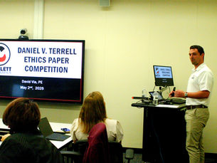 David Via speaking at Ethics Paper Competition