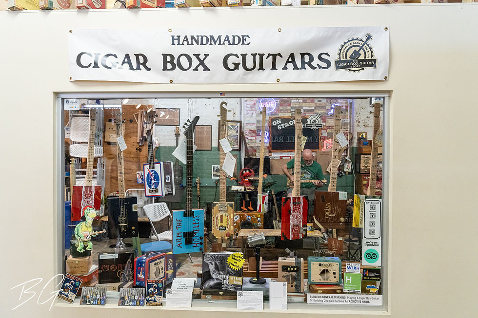 Handmade cigar box guitars in Huntsville, Alabama by Bud Gambrell for Mixed Alternative Magazine