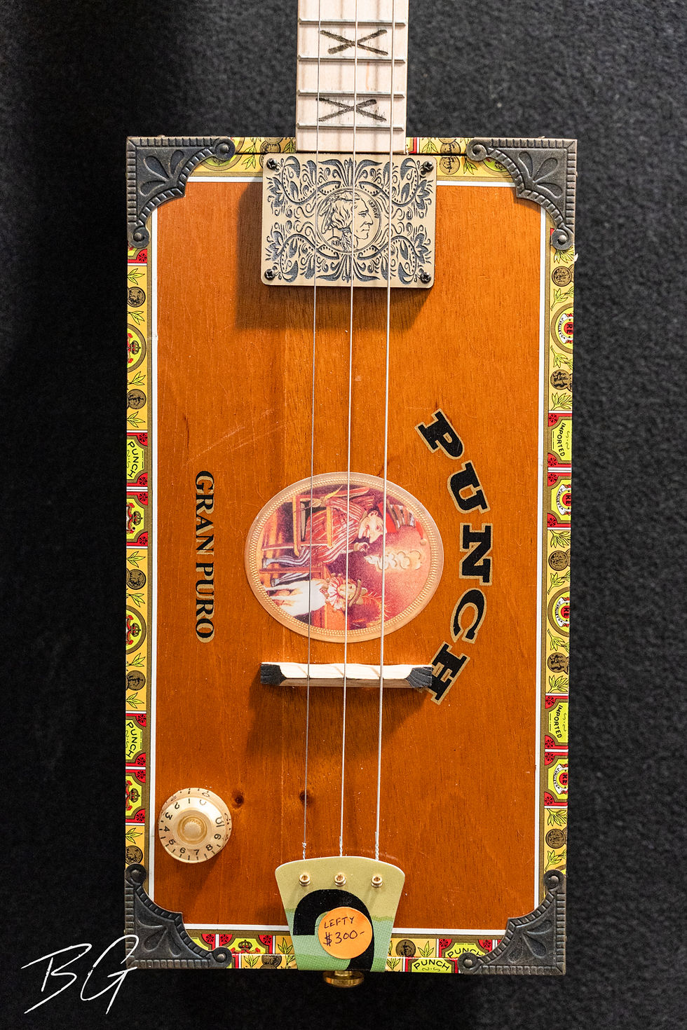 A cigar box guitar made by The Cigar Box Guitar Shop in Huntsville, Alabama. Photo by Bud Gambrell for Mixed Alternative Magazine.