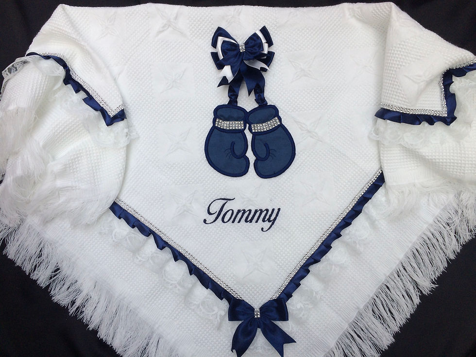 Baby’s personalised shawl with boxing gloves motif 