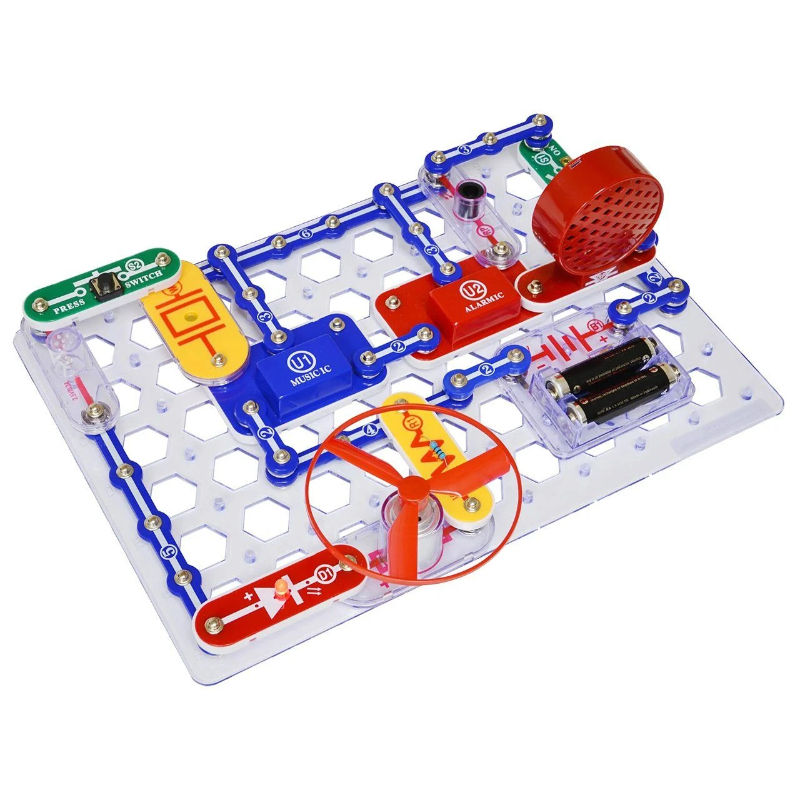 Snap Circuits Jr. kit with colorful snap-together electronic parts on a base grid