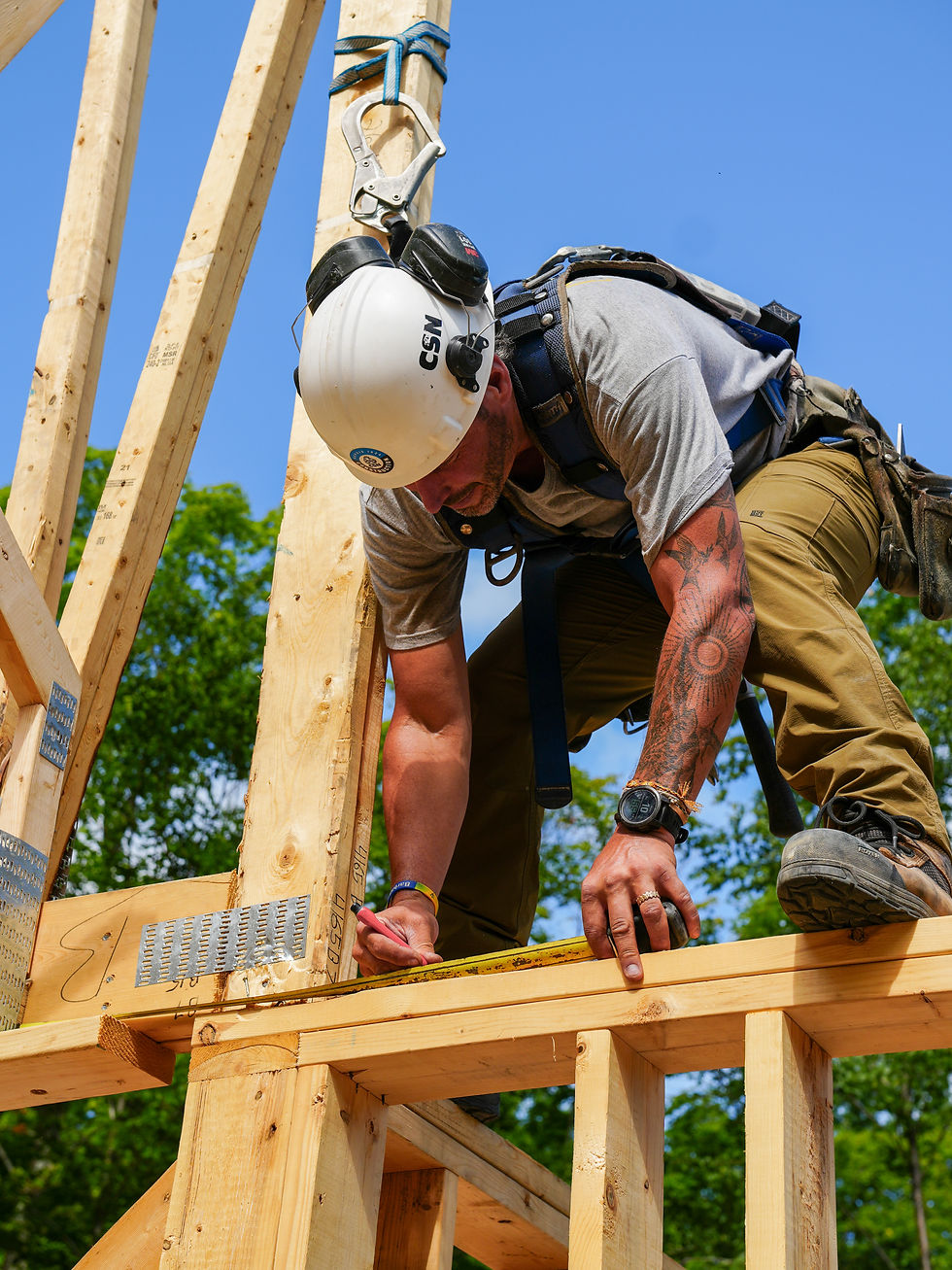 Fondateurs d’Arfang Construction en action sur un projet résidentiel