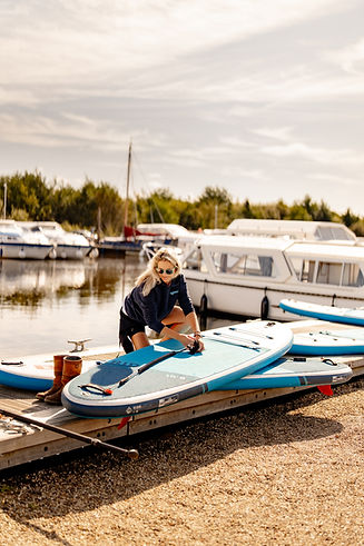 Paddleboarding with friends at Horning Marina