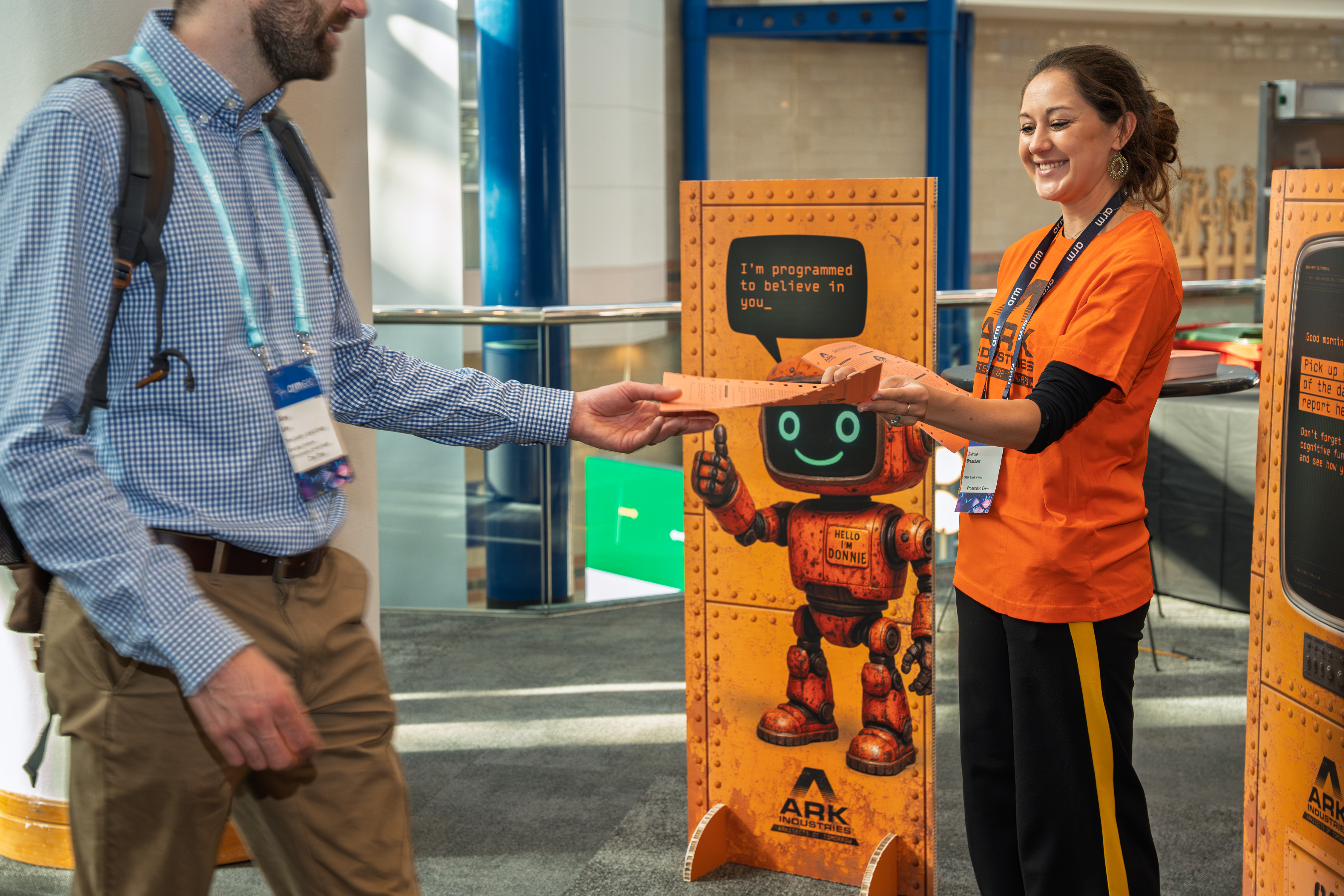 Armageddon — two attendees at exhibit stand