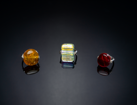 Round Rings: Amber & Garnet | Rectangle Ring: Gold