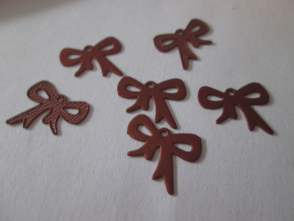Miniature : 10 estampes noeud  - 14 x 12 mm - 5 coloris - laiton