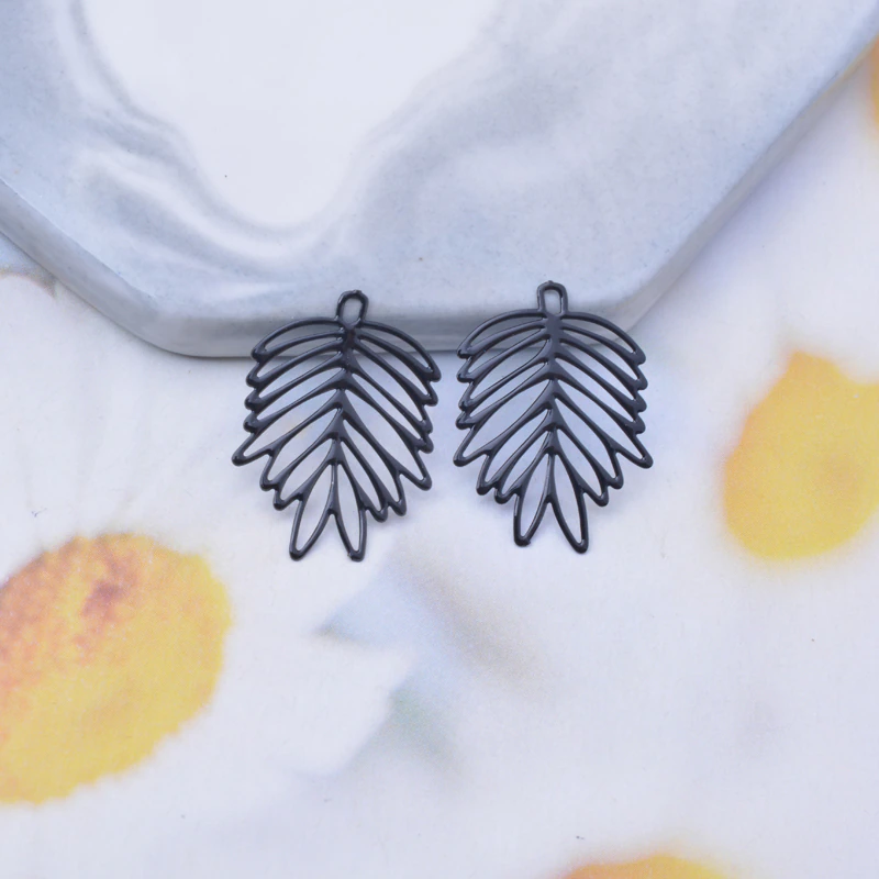 Thumbnail: 2 estampes feuilles de phoenix - 21 x 16 mm - 10 coloris - laiton